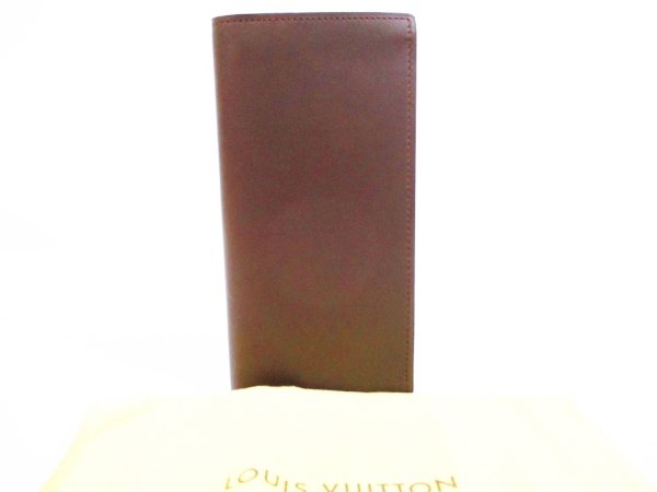 Photo1: LOUIS VUITTON Nomade Leather Dark Brown Long Wallet Portefeuille Brazza #6706