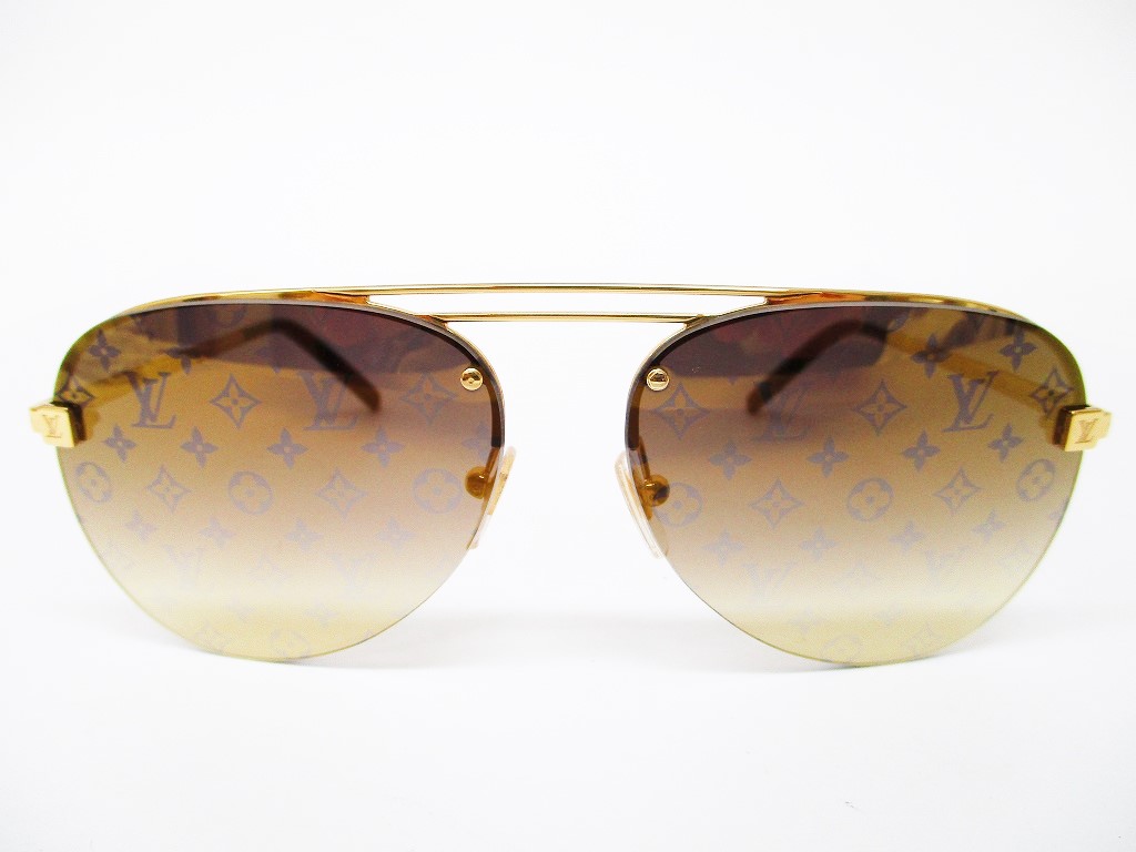 Louis Vuitton Clockwise Sunglasses Gold Monogram Metal. Size E