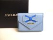 Photo1: PRADA Ribbon Motif Light Blue Leather Trifold Wallet Compact Wallet #a233