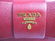 Photo10: PRADA Red Saffiano Leather Ribbon Motif Round Zip Long Wallet #a334