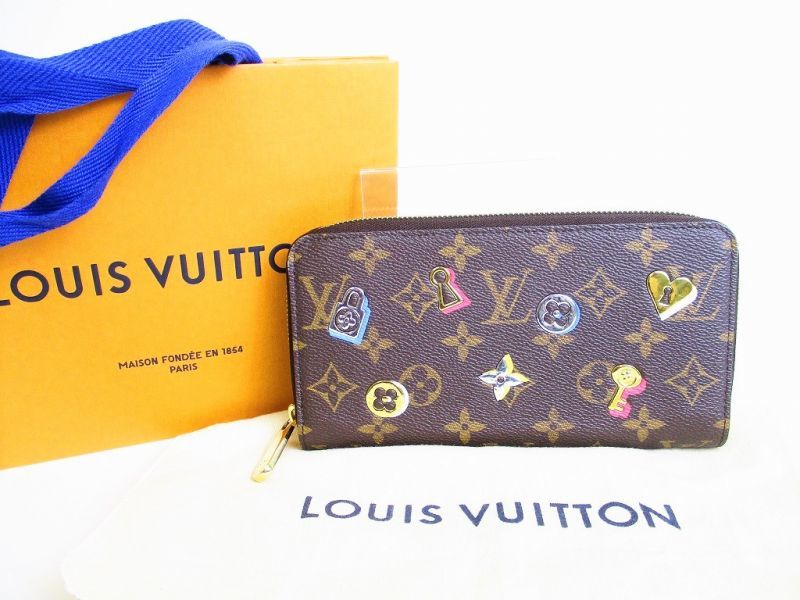 Photo1: LOUIS VUITTON Monogram Love Lock Leather Round Zip Zippy Wallet #7763